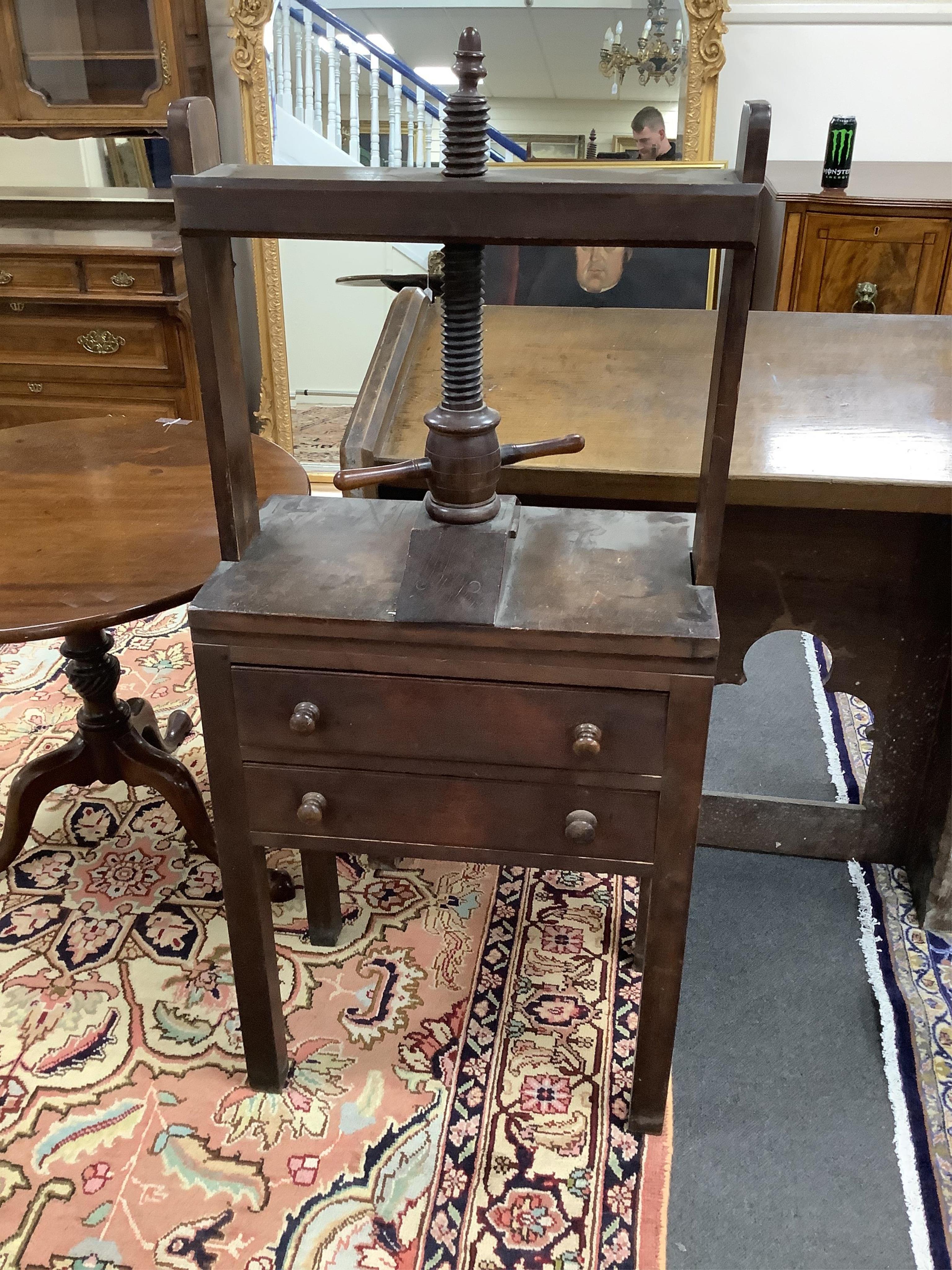 A Victorian mahogany book press, width 60cm, depth 35cm, height 132cm. Condition - fair